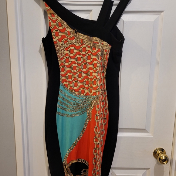 Designer Dress! Size 10. Multi color. Simply stunning, eye-catching. - Picture 2 of 2